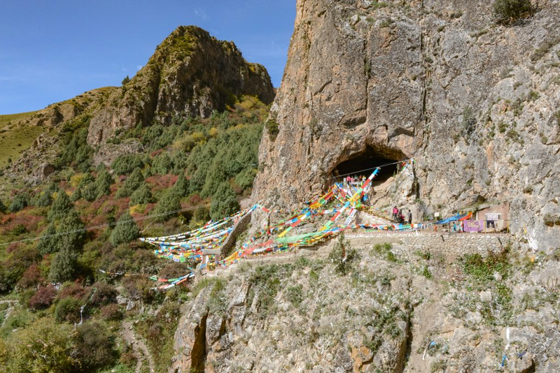 The entrance to Baishiya Karst Cave, with Buddhist ornamentation.